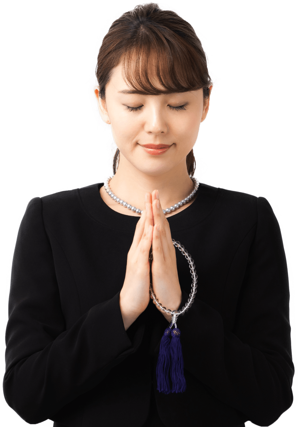 手を合わせる女性